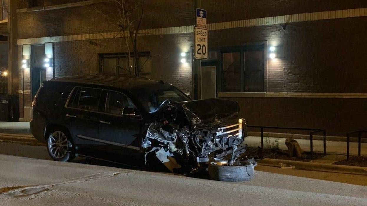 A Cadillac Escalade after crashing into seven parked vehicles April 16, 2020, in the 3000 block of North Kimball Avenue.
