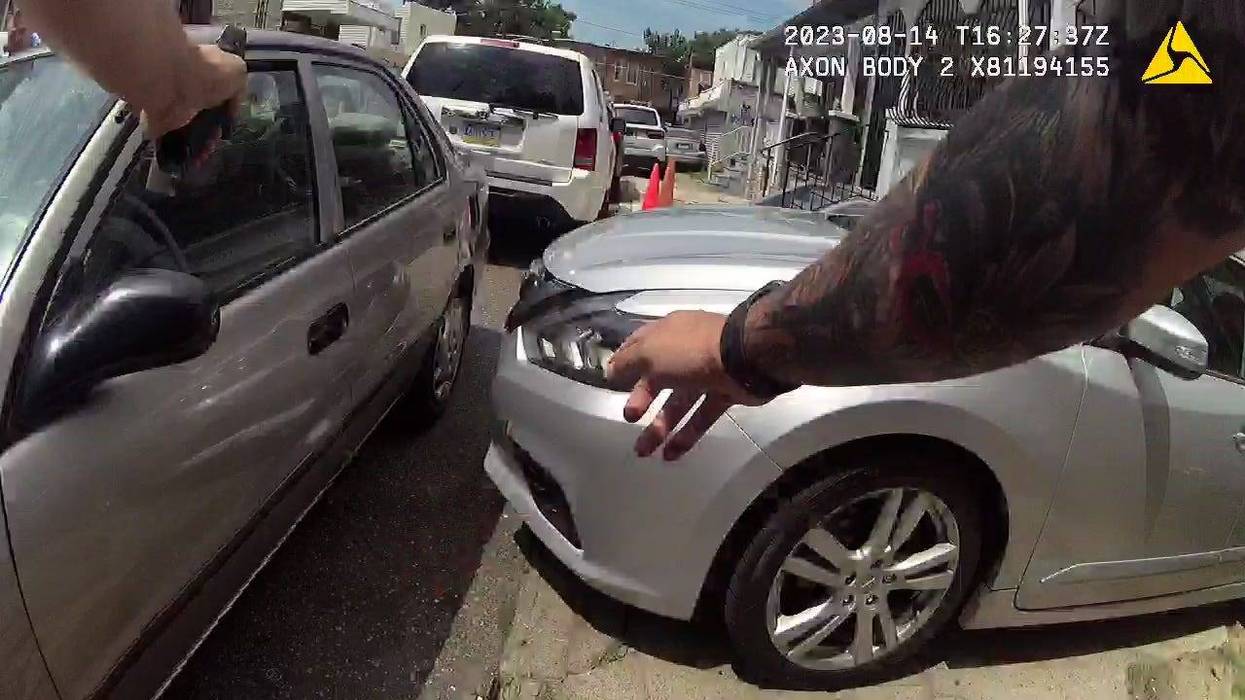 A camera worn by Officer Mark Dial shows the shooting death of Eddie Irizarry on Aug. 14, 2023.