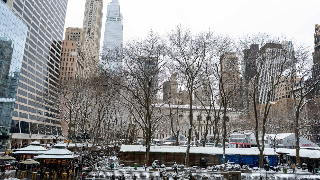 A Canadian tourist was stabbed while tying his shoe in an unprovoked attack near Bryant Park on Monday evening, sources said
