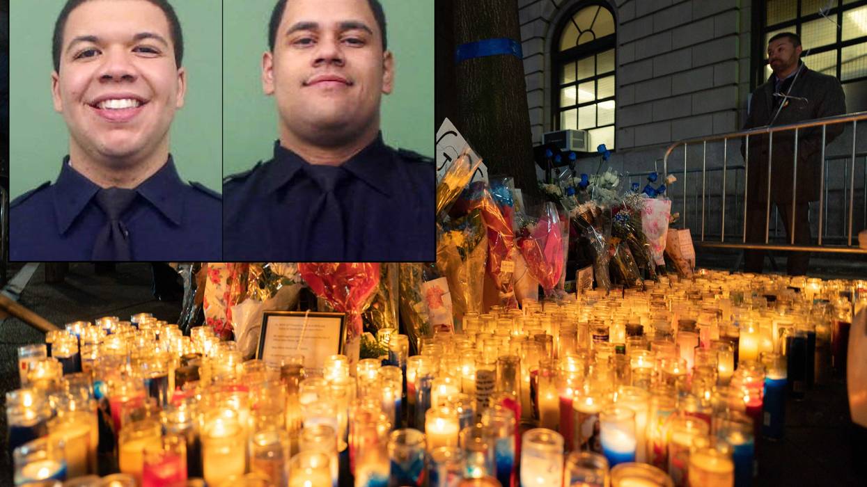 A candlelight vigil was held at the 32nd Precinct stationhouse in Harlem on Jan. 24, 2022. Inset: Officers Jason Rivera and Wilbert Mora