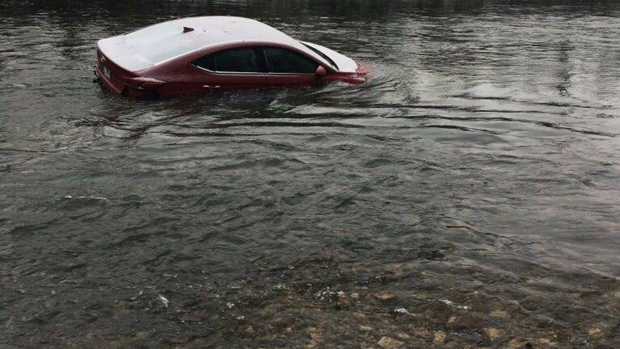 A car and a body were found a short distance away from each other Sunday in the Des Plaines River in the western suburbs.