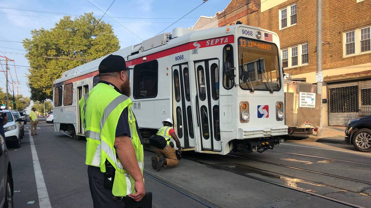 A car collided with a trolley Sunday morning, knocking it off its tracks at the intersection of 52nd Street and Chester Avenue for several hours.