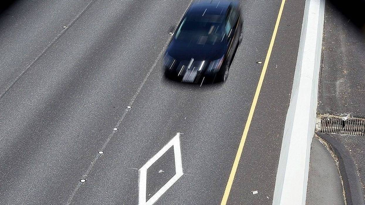 A car drives in the carpool lane on highway 101 on May 6, 2011 in San Rafael, California.