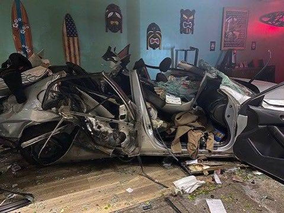 A car has been totaled after crashing through the storefront of a Santa Rosa coffee shop early Thursday morning.