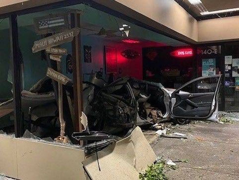 A car has been totaled after crashing through the storefront of a Santa Rosa coffee shop early Thursday morning.