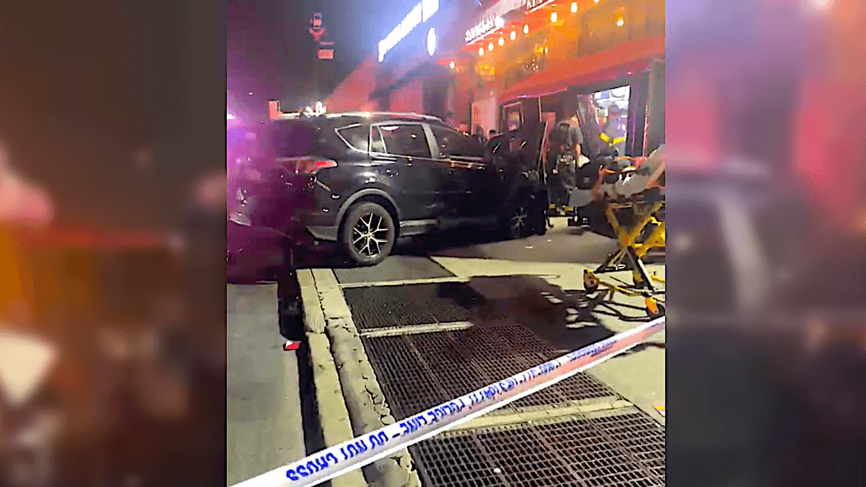 A chain-reaction crash caused a Toyota RAV4 driven by an Uber driver to barrel into the Inwood Bar & Grill on Broadway Monday night