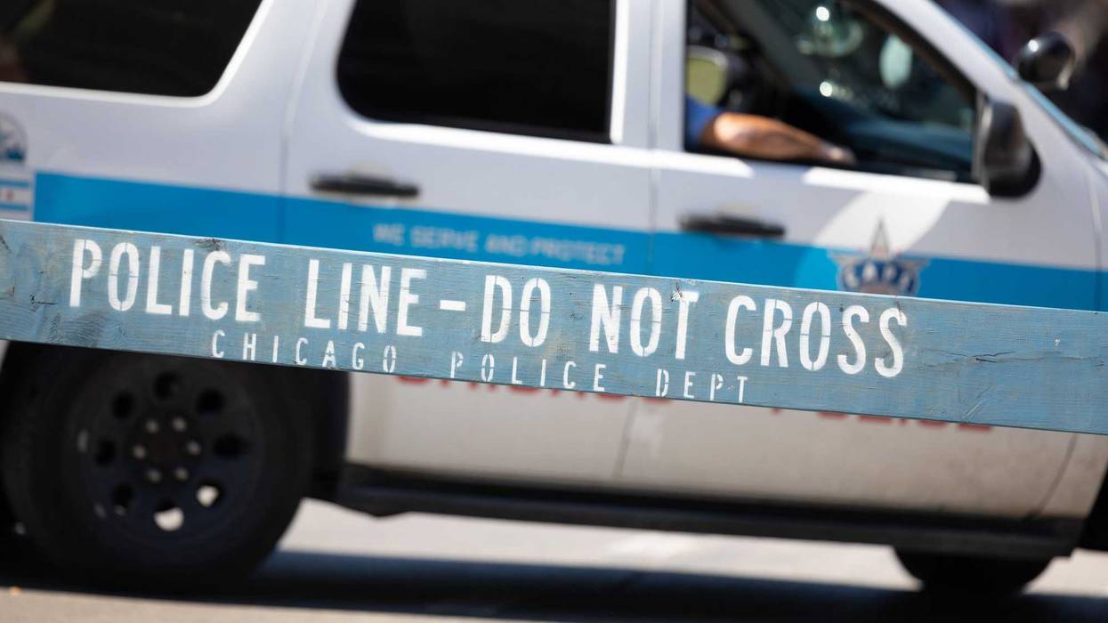 A Chicago police SUV behind a barricade.