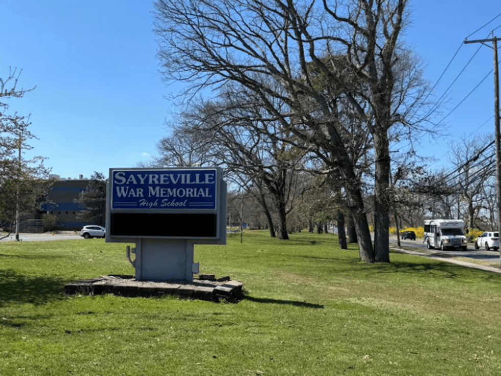 A child was found dead in a burning car in the vicinity of Sayreville War Memorial High School on Friday. Photo credit