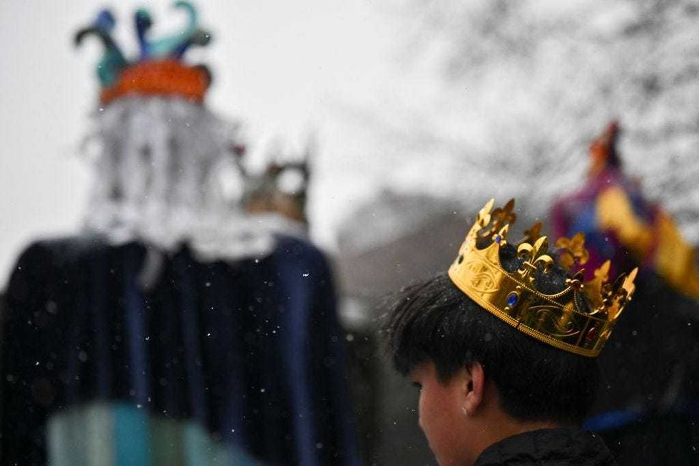A child wears a crown at the Three Kings Day parade out on by El Museo del Barrio in East Harlem on Jan. 6, 2025.