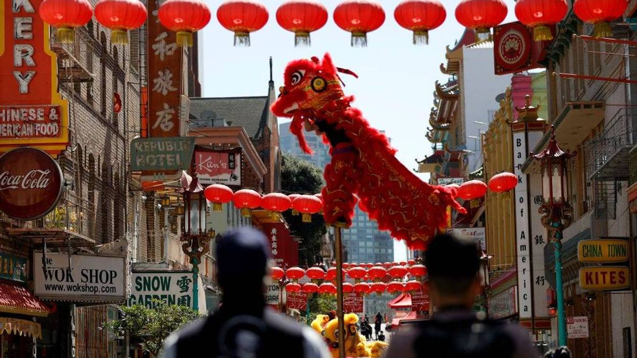 A Chinese Dragon Dance team performs on Grant Avenue in Chinatown on March 20, 2021 in San Francisco, California.