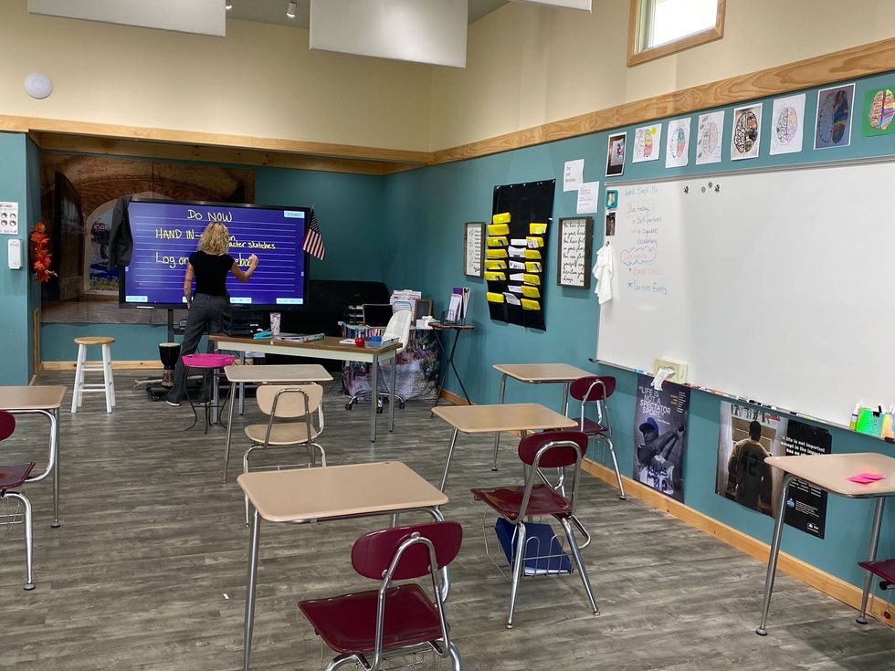 A classroom at Creativity CoLaboratory Charter in Elmer, N.J., has extra space between desks.