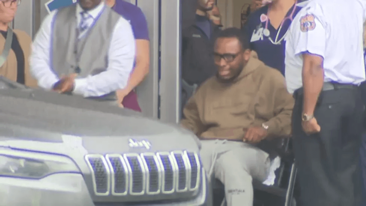 A close up of the officer emerging from Penn Presbyterian Hospital on Thursday, May 22, 2025.