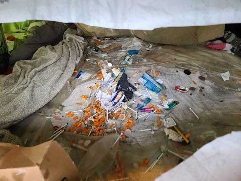 A closeup of the encampment where Mayor Adams said 500 hypodermic needles were found