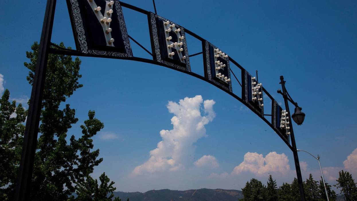 A cloud rises above the McKinney Fire west of Yreka on Tuesday, Aug. 2, 2022, as the blaze continues to burn in steep terrain in western Siskiyou County. Yreka and the surrounding area had been blanketed by thick smoke during a weather inversion layer.
