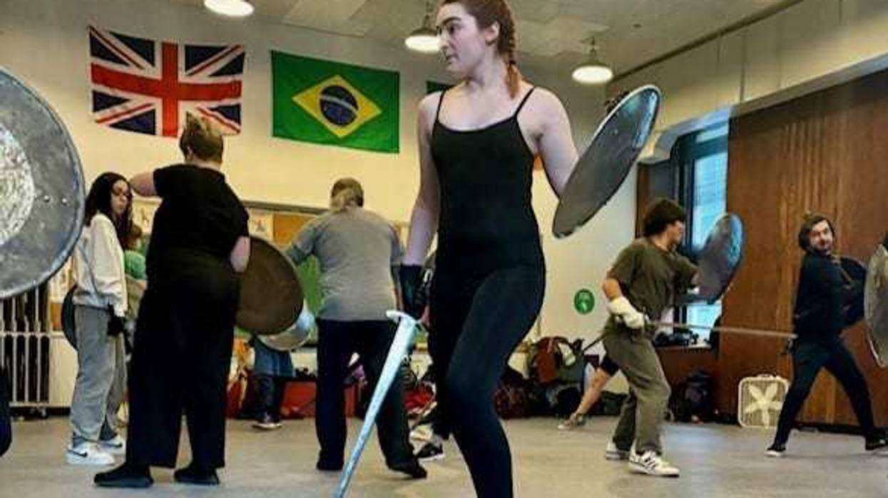 A Columbia College student takes part in a class designed to teach the art of wielding weapons and using fight choreography.