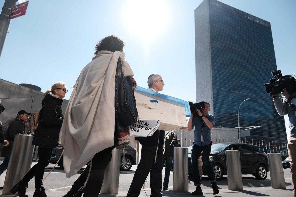 A committee of Ukrainian leaders, rabbis and other religious figures participate in a morning protest in front of the U.S. Mission to the United Nations to call on the U.S. government to do more to halt Russia
