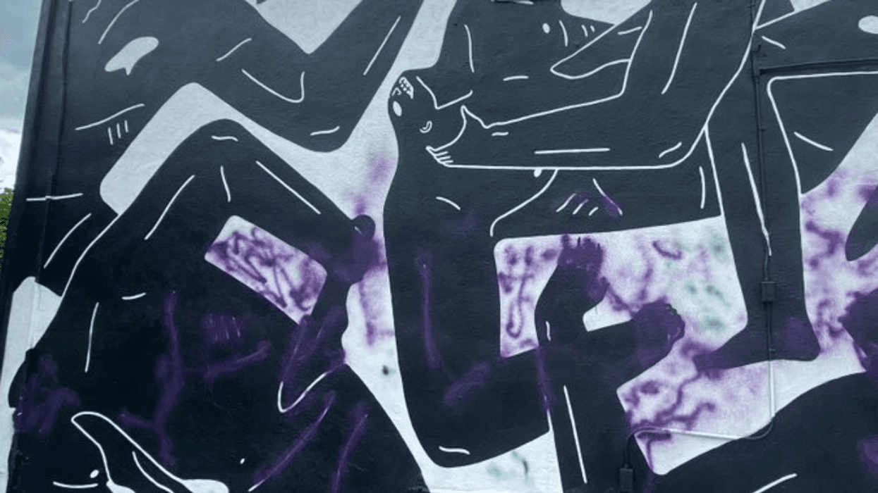 A controversial mural outside an Altadena coffee shop has been vandalized