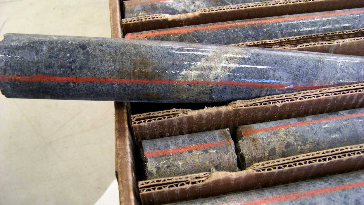 A core sample drilled from underground rock near Ely, Minn., shows a band of shiny minerals containing copper, nickel and precious metals, center, that Twin Metals Minnesota LLC, hopes to mine near the Boundary Waters Canoe Area Wilderness in northeastern Minnesota.