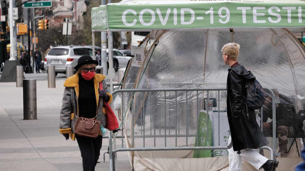 A COVID-19 testing site stands on a Brooklyn street corner on April 18, 2022 in New York City