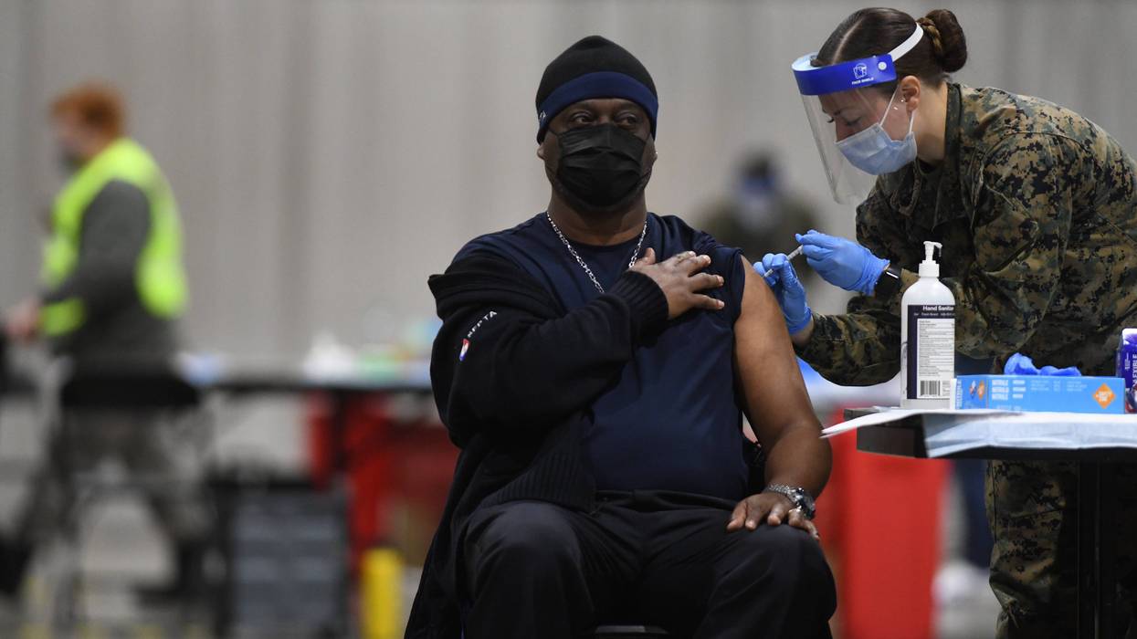 A COVID-19 vaccine being administered at the Pennsylvania Convention Center in Philadelphia.