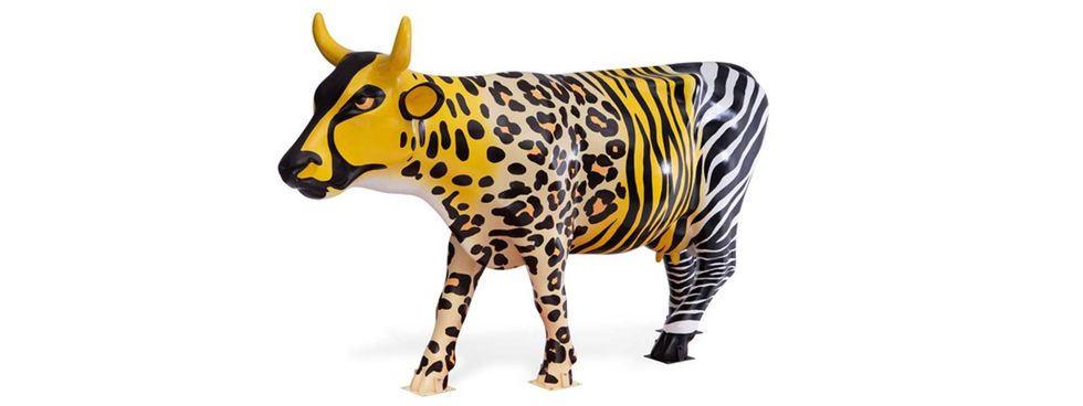 A cow titled "A Leopard Can Change His Spots," by artists Jamie Drake, displayed in Queens.