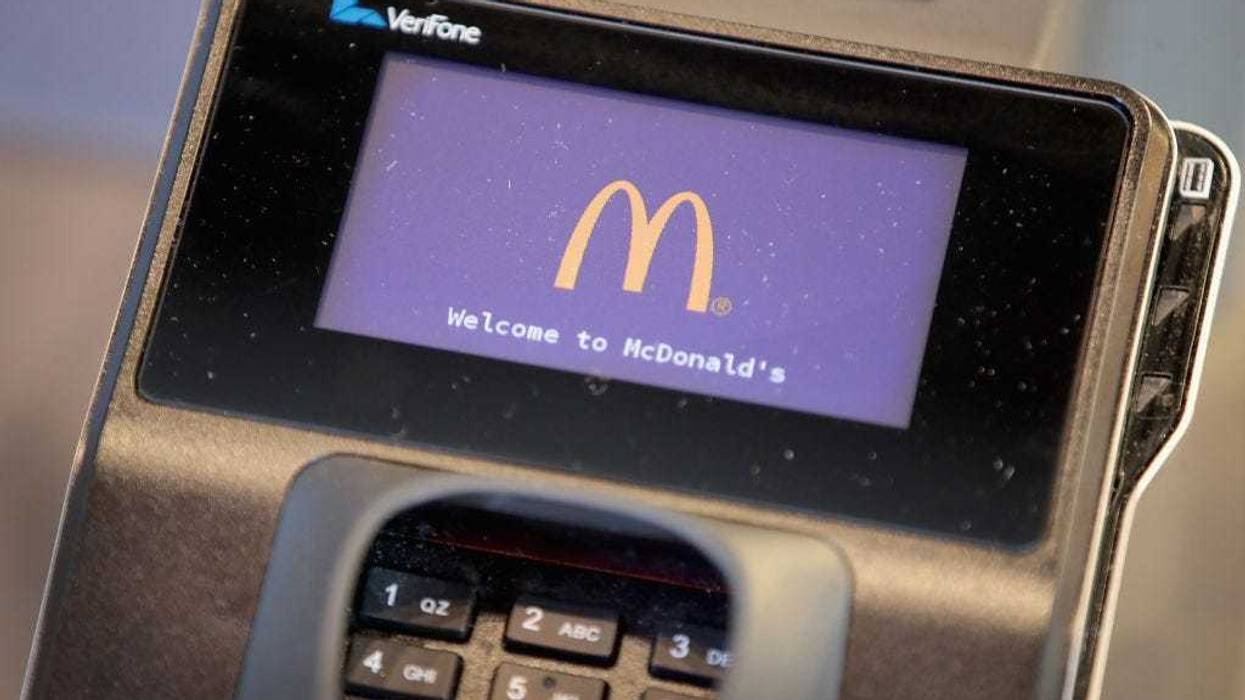 A credit card scanner sits on the counter of a McDonald's restaurant located inside the new corporate headquarters on June 4, 2018 in Chicago, Illinois. The company headquarters recently returned to the Chicago, which it left in 1971, from suburban Oak Brook. Approximately 2,000 people will work from the building. (Photo by Scott Olson/Getty Images)