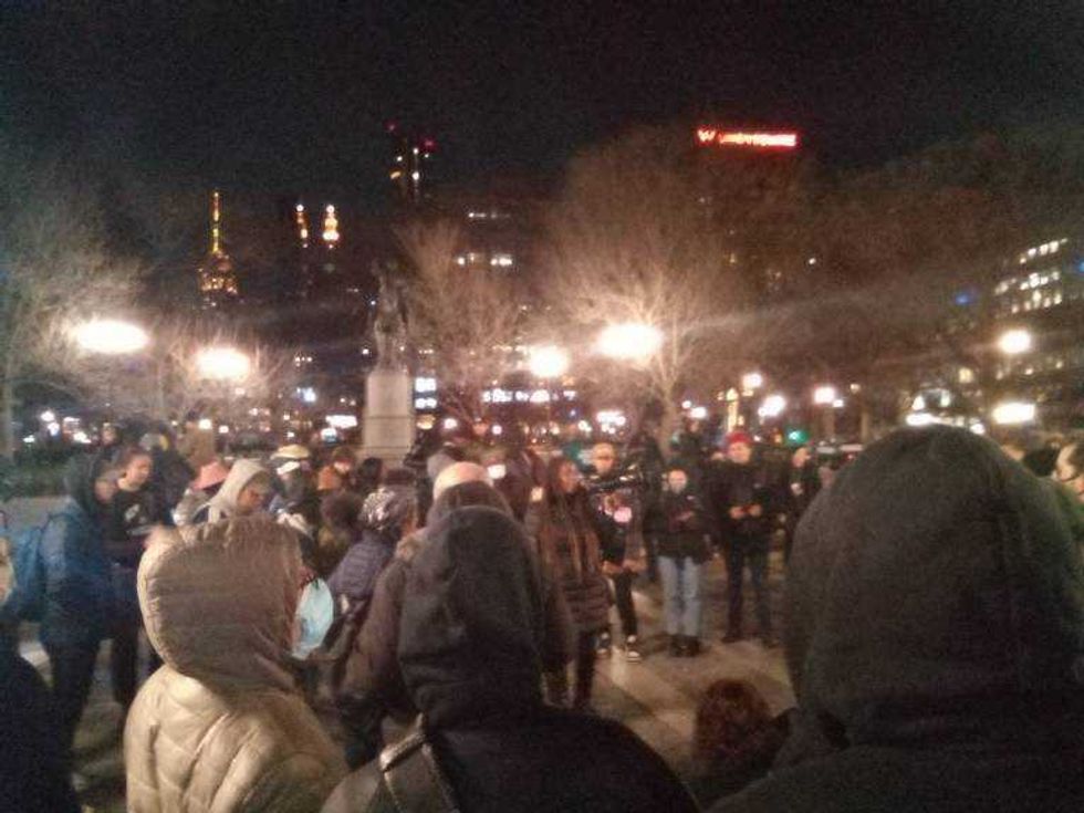 A crowd gathers around a speaker at Union Square.