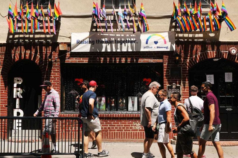A crowd gathers outside the Stonewall Inn as New York City celebrates Pride Month on June 26, 2019 in New York City.