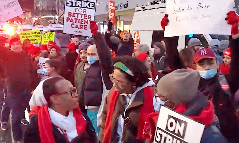 A crowd of striking nurses grew outside Mount Sinai Hospital in Manhattan on Monday morning