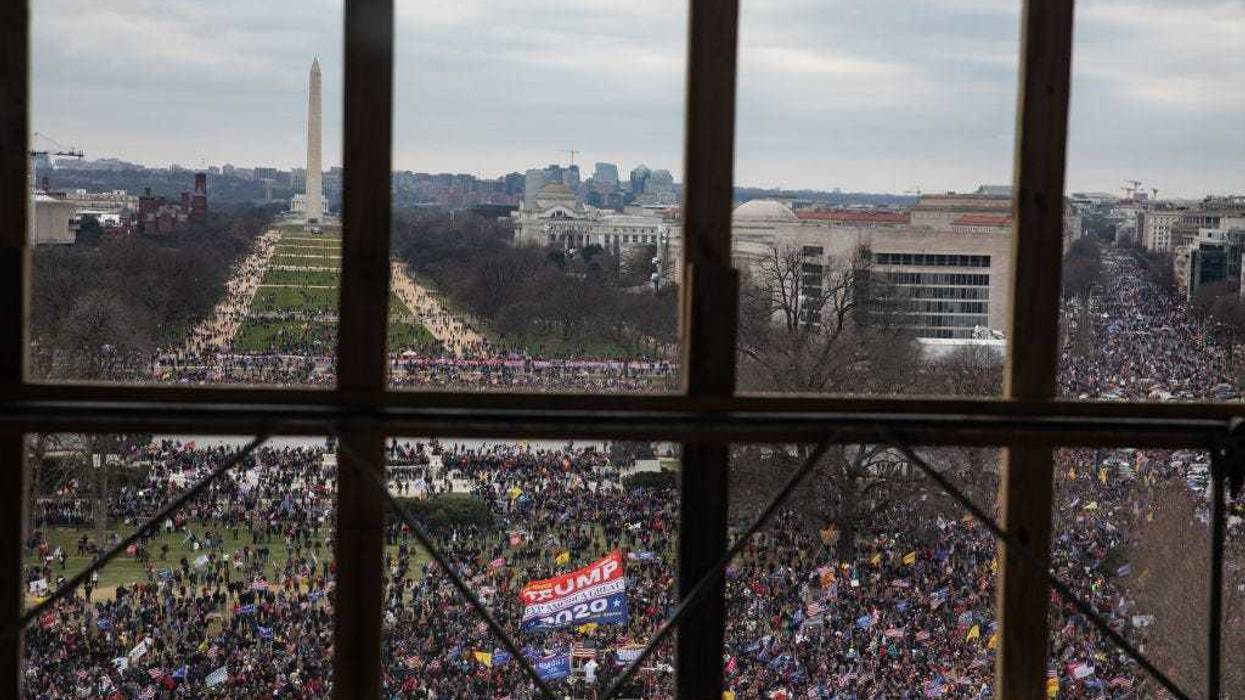 A crowd of Trump supporters gather outside as seen from inside the U.S. Capitol on January 6, 2021 in Washington, DC. Congress will hold a joint session today to ratify President-elect Joe Biden's 306-232 Electoral College win over President Donald Trump. The joint session was disrupted as the Trump supporters breached the Capitol building. (Photo by Cheriss May/Getty Images)