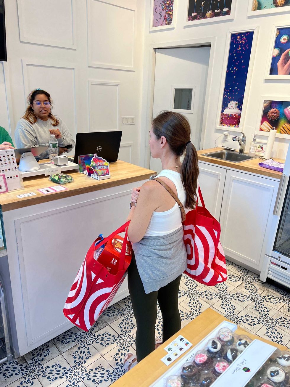 A customer at a Baked by Melissa store on the Upper East Side buys the Claussen cupcakes on July 8, 2024.