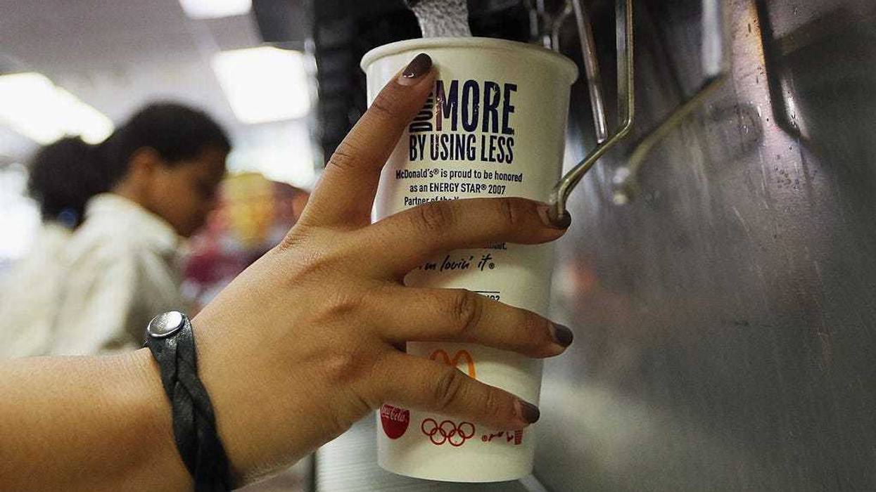 A customer fills a 21 ounce cup with soda at a 'McDonalds' on September 13, 2012 in New York City.
