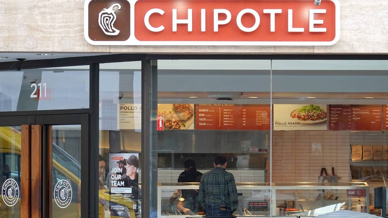 A customer orders food at a Chipotle restaurant on April 26, 2022 in San Francisco, California.