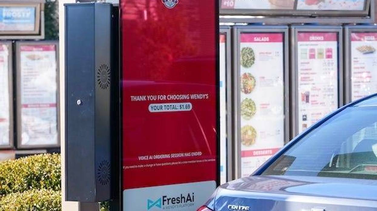 A customer orders from Wendy's new Fresh AI drive through system at the Maxtown Road Westerville location