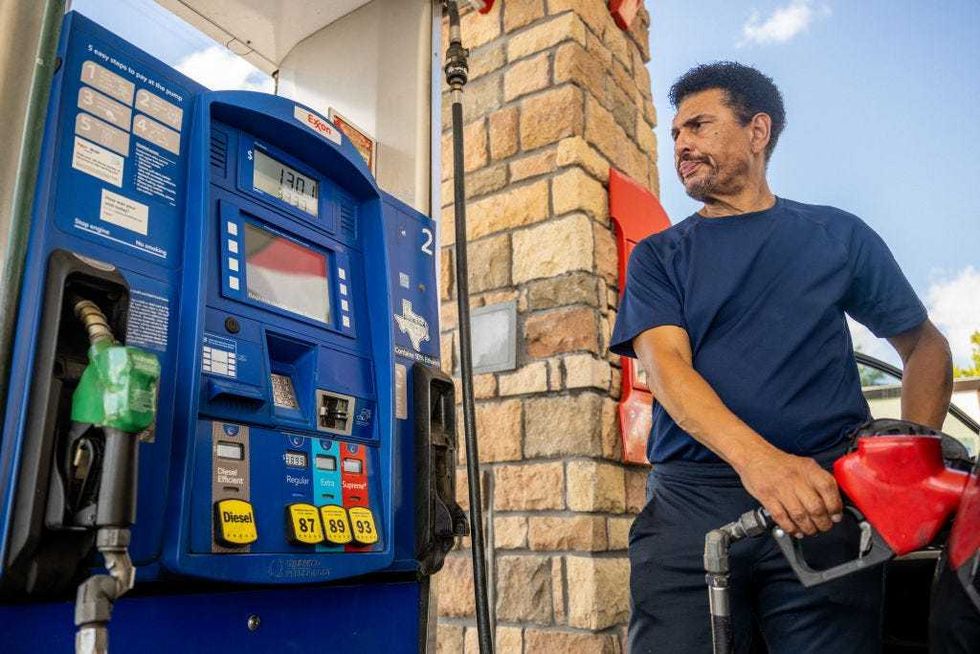 A customer pumps gas at an Exxon gas station on July 29, 2022 in Houston, Texas. Exxon and Chevron posted record high earnings during the second quarter of 2022 as energy stocks have faltered in recent months. (Photo by Brandon Bell/Getty Images)