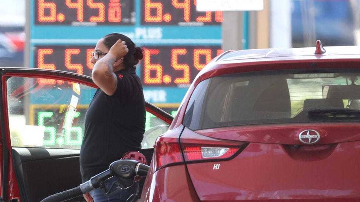 A customer pumps gas into their car at a gas station on May 18, 2022 in Petaluma, California. Gas prices in California have surpassed $6.00 per gallon for the first time ever. The average price per gallon of regular unleaded gasoline in California is at $6.05 and $6.29 in the San Francisco Bay Area. (Photo by Justin Sullivan/Getty Images)
