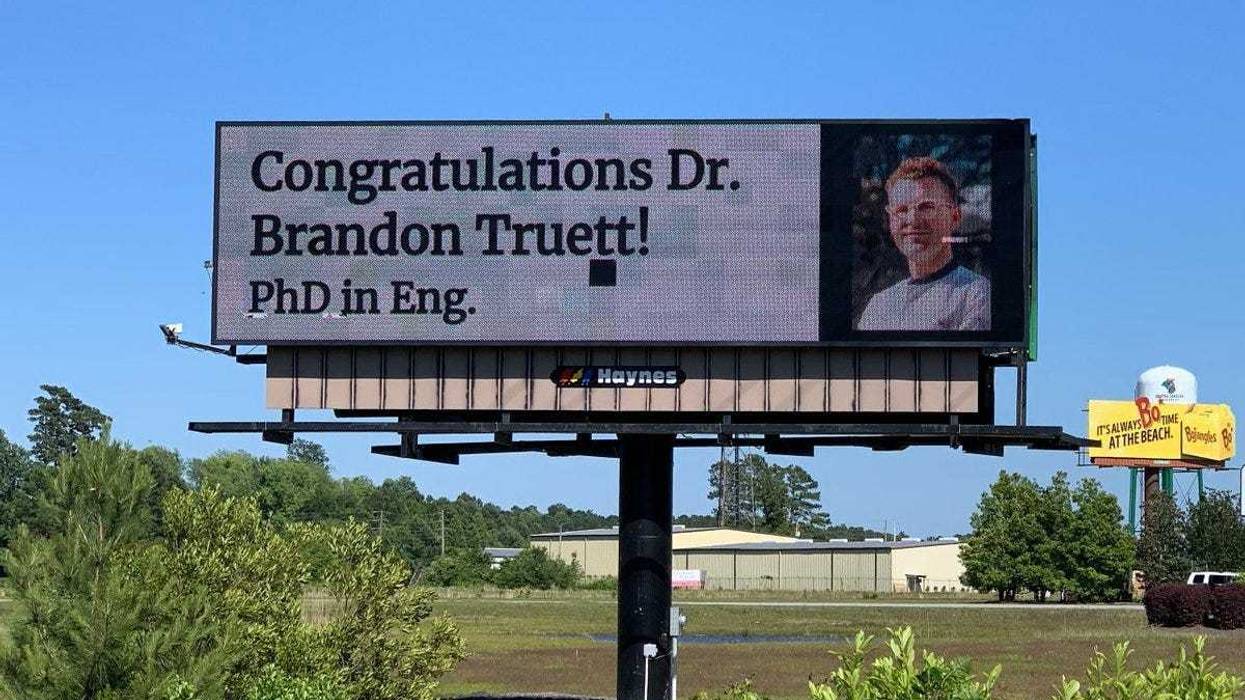 A dad wanted to show his son how proud he was of him for earning a doctoral degree at the University of Chicago and he came up with a special way to show it.