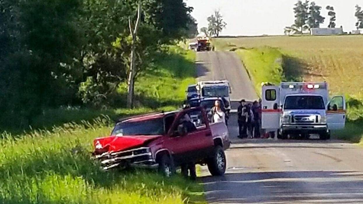 A damaged truck sits on the side of the road after an accident involving a horse-drawn carriage on Friday, June 7, 2019 in California Township, Mich. Michigan State Police said the pick up truck was headed southbound when the driver rear ended an Amish, h