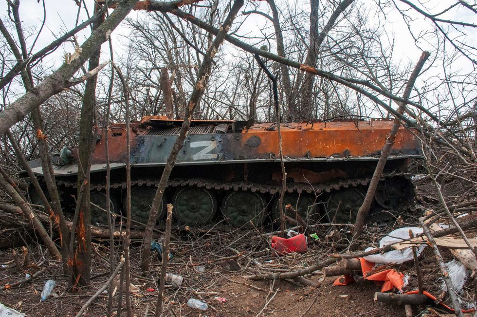 A destroyed armored vehicle is seen near the village of Malaya Rohan, Kharkiv region, Ukraine, Friday, April 1, 2022