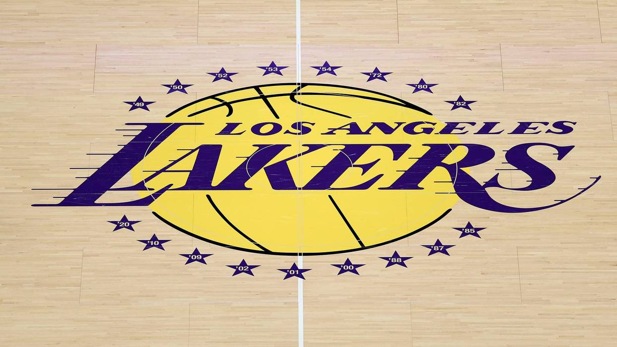 A detailed view of a Los Angeles Lakers logo on the court before the game against the Golden State Warriors at Crypto.com Arena on October 21, 2025 in Los Angeles, California.