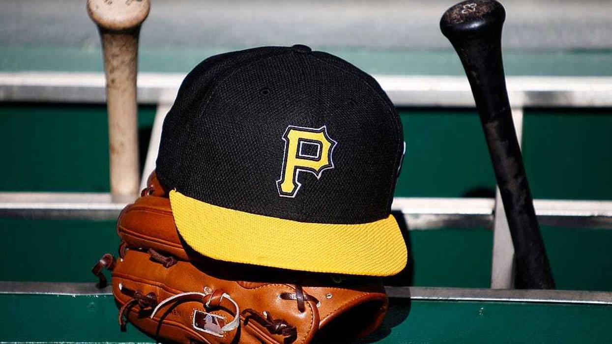 A detailed view of a Pirates hat and glove