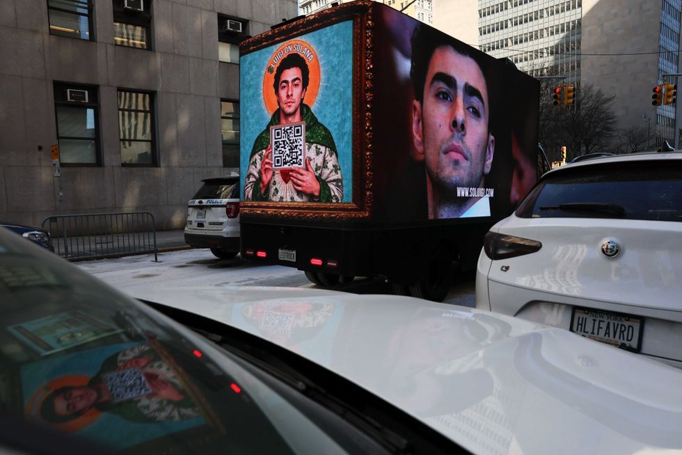 A digital billboard truck is seen on Centre Street displaying images of Luigi Manigione near Manhattan Criminal Court on February 21, 2025