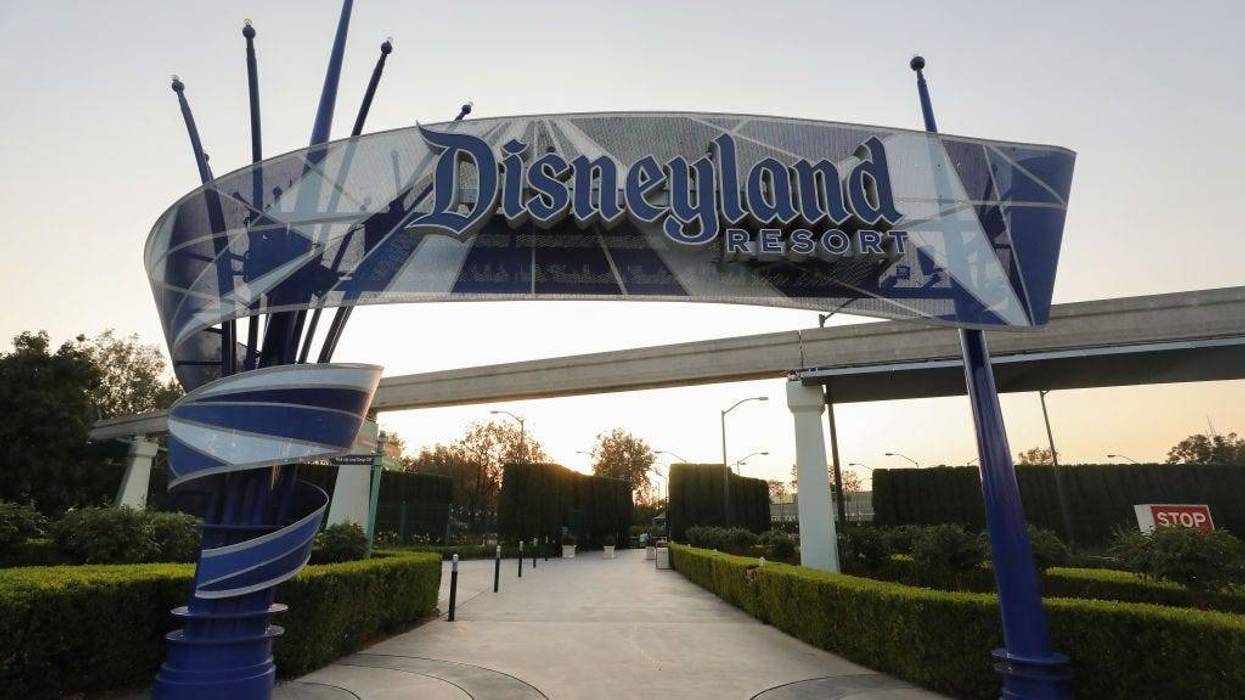 A Disneyland sign is posted at an empty entrance to Disneyland on September 30, 2020 in Anaheim, California. Disney unveiled an updated annual pass system with four different "Magic Key" levels.
