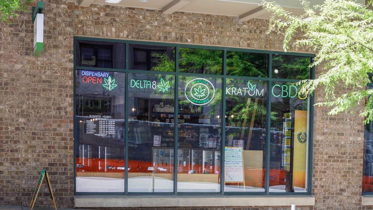 A dispensary displays signs for Delta-8 and other hemp-based products.