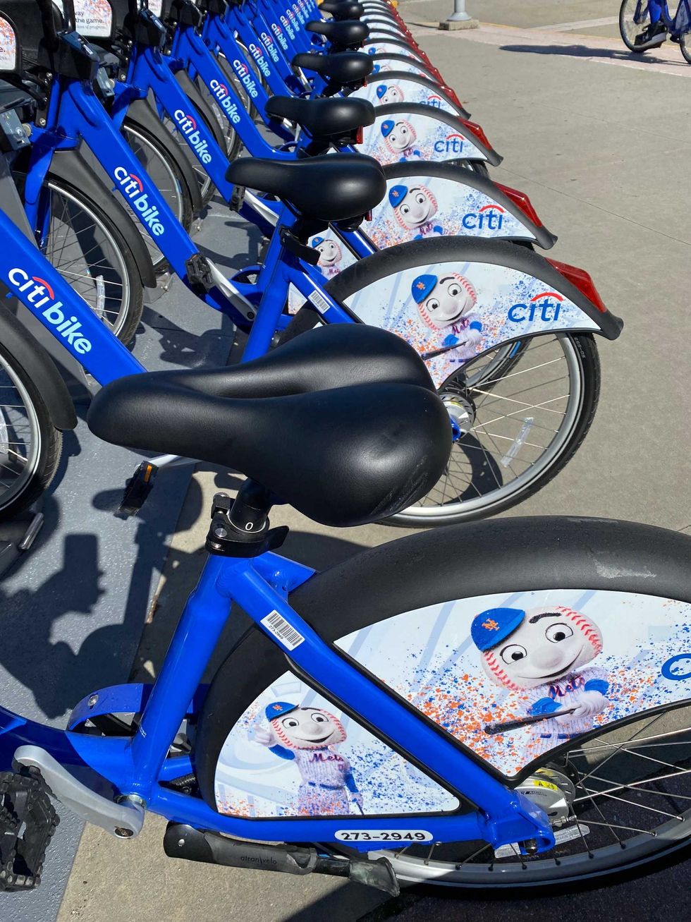 A docking station of newly-installed Citi Bikes, bearing images of Mr. and Mrs. Met, at Citi Field at a ribbon-cutting ceremony on March 21, 2024.