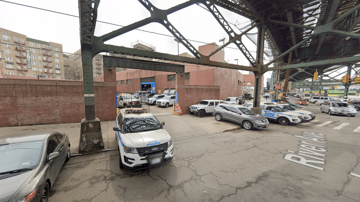 A domestic violence suspect walked out of the 44th Precinct stationhouse on Wednesday night, police said