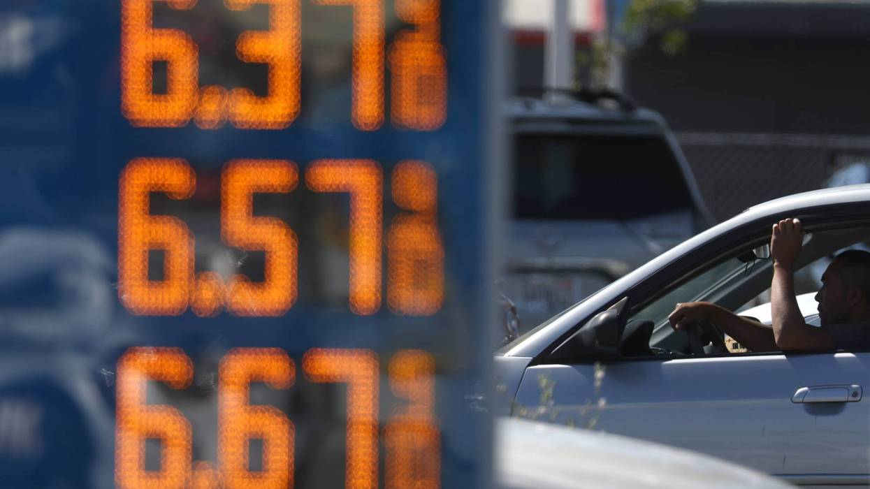 A driver passes a sign with gas prices over $6.00 per gallon on May 20, 2022 in San Rafael, California.