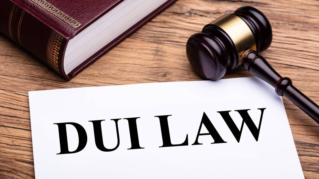 A "DUI Law" sheet of paper and a judge's gavel