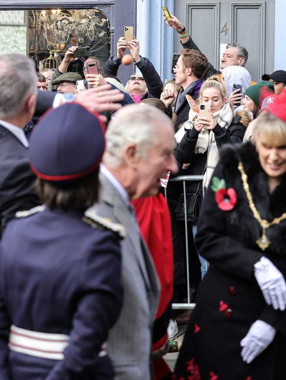 A egg is thrown by a member of the public as King Charles III and Camilla, Queen Consort arrive for the Welcoming Ceremony to the City of York at Micklegate Bar during an official visit to Yorkshire on November 09, 2022 in York, England. (Photo by Chris Jackson/Getty Images)