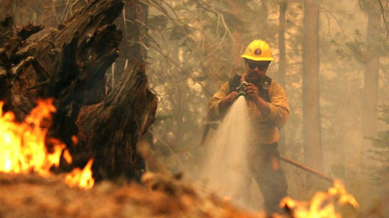 A father and son have been arrested for reckless arson in connection with the devastating Northern California Caldor Fire.